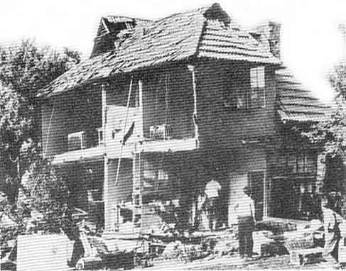 Photo d'une maison endommage